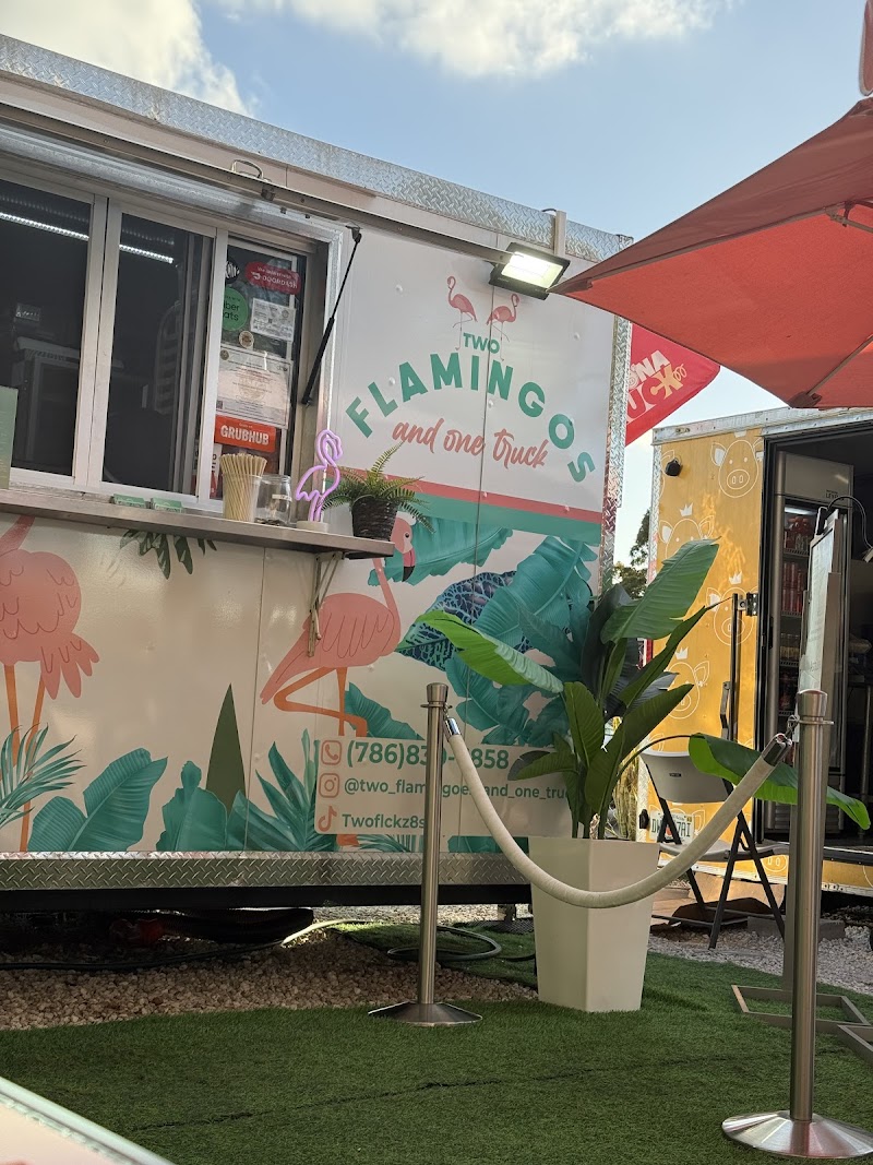 Two Flamingos and One Truck