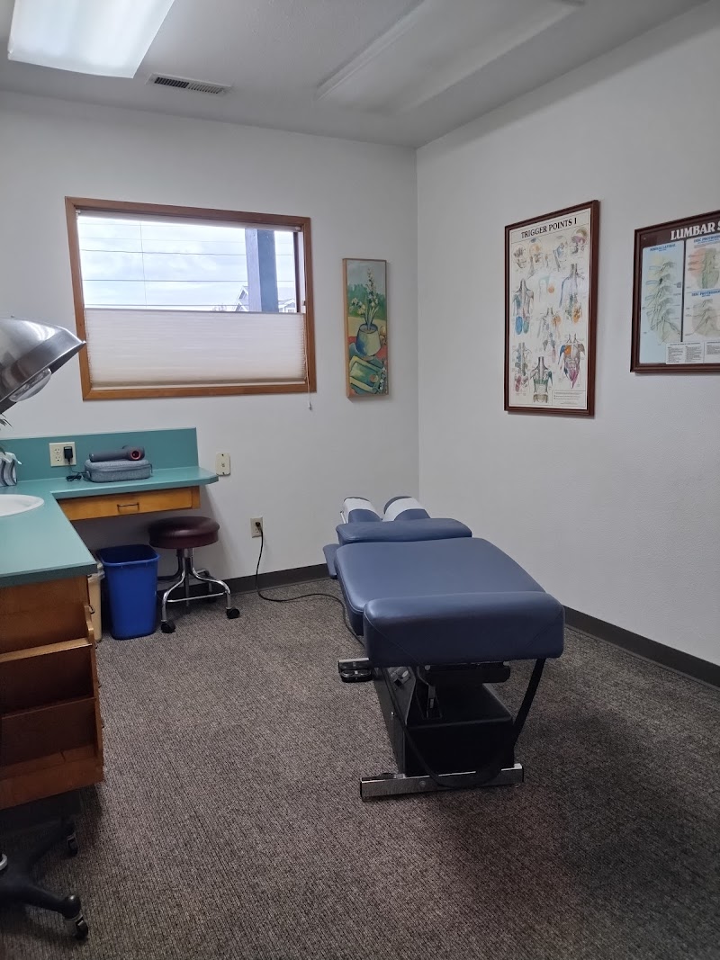 Patient receiving a precise chiropractic adjustment from Dr. Turner