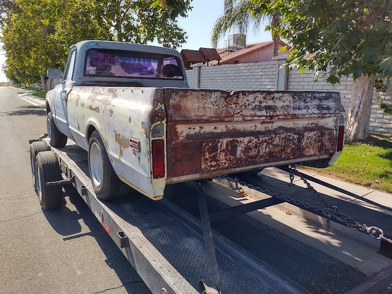 Paint booth refinishing—professional color matching and coating.