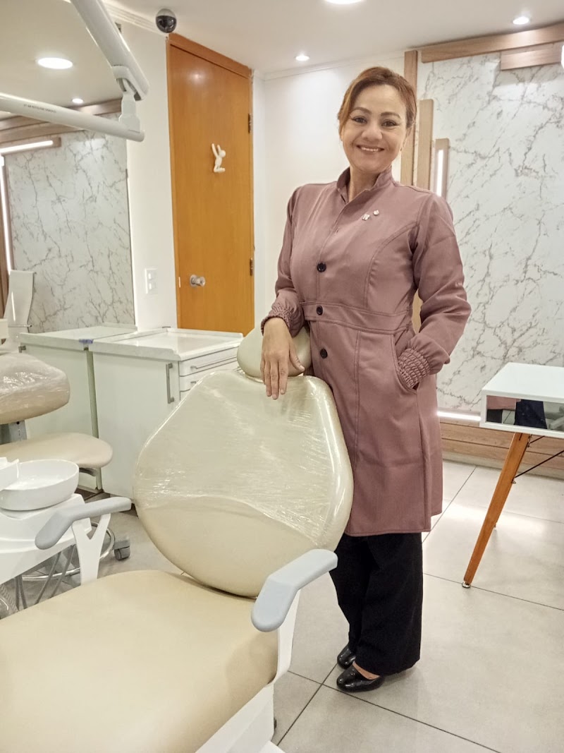 Dra. Elisabete Mendes - Dentista 24h Av. Paulista- Urgência e Prótese