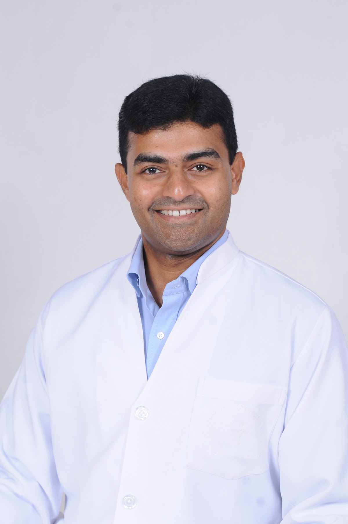 Dr.Reji Moideen- MINT DENTAL CARE LLC