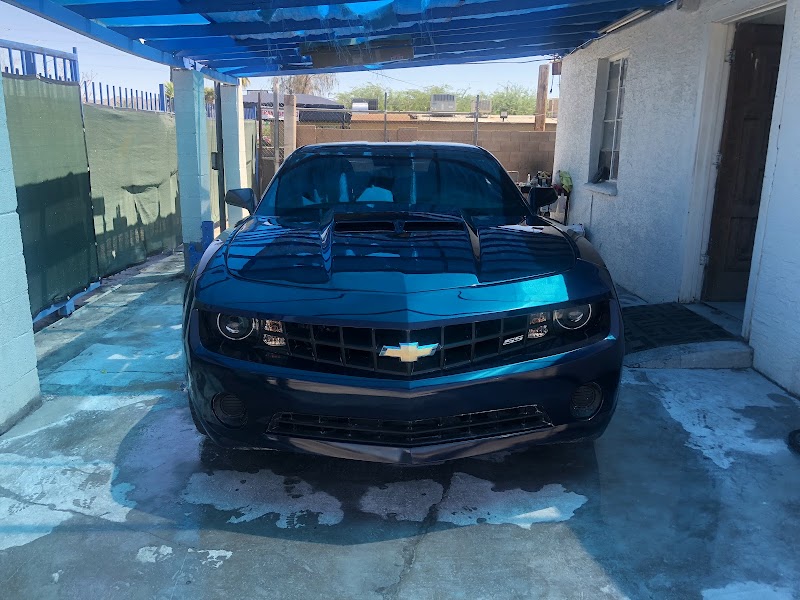 Fresh paint application booth with precision color matching in progress.
