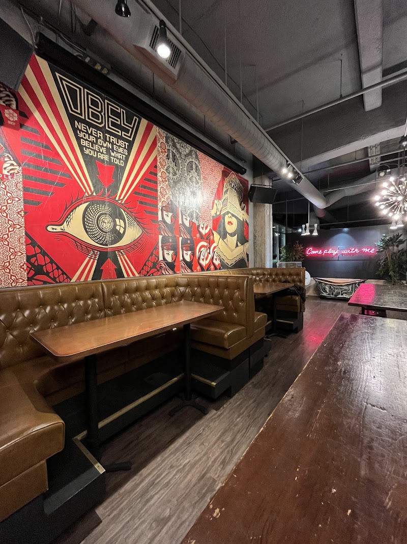 Bright, energetic setting with a club vibe and DJ music