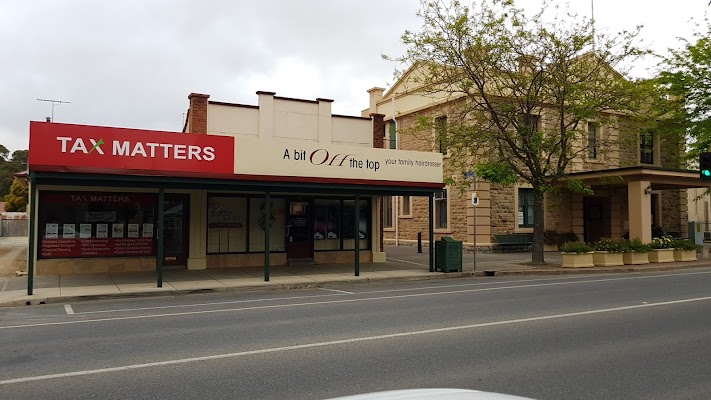 A Bit Off the top photo 2