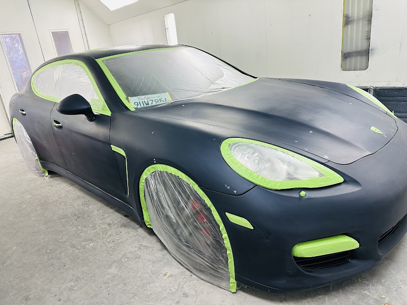 Honda Milano Red front lip refinish in progress—custom paint work done right.