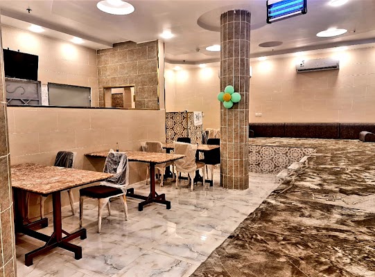 مطاعم ومطابخ الرنة المتميزة للخروف المشوي والمندي