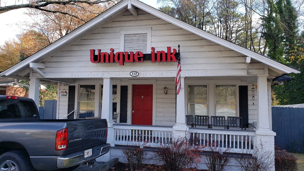 Unique Ink Tattoo Studio tattoo work — photo 2