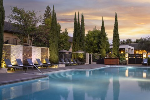 Heated outdoor pool and courtyard with fire pit