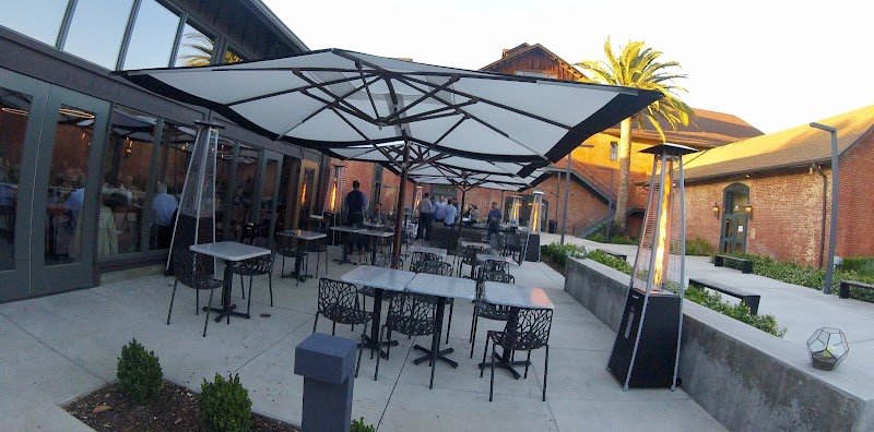 Indoor-outdoor dining with garden ambiance