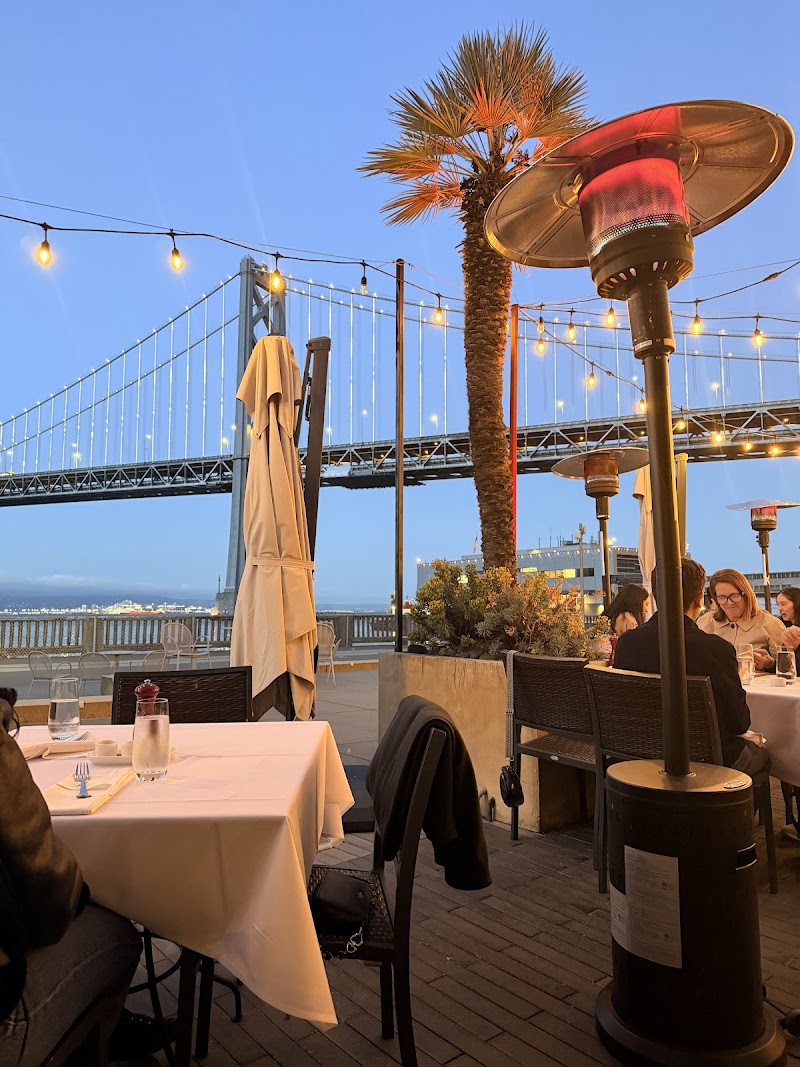 Outdoor seating with waterfront ambiance