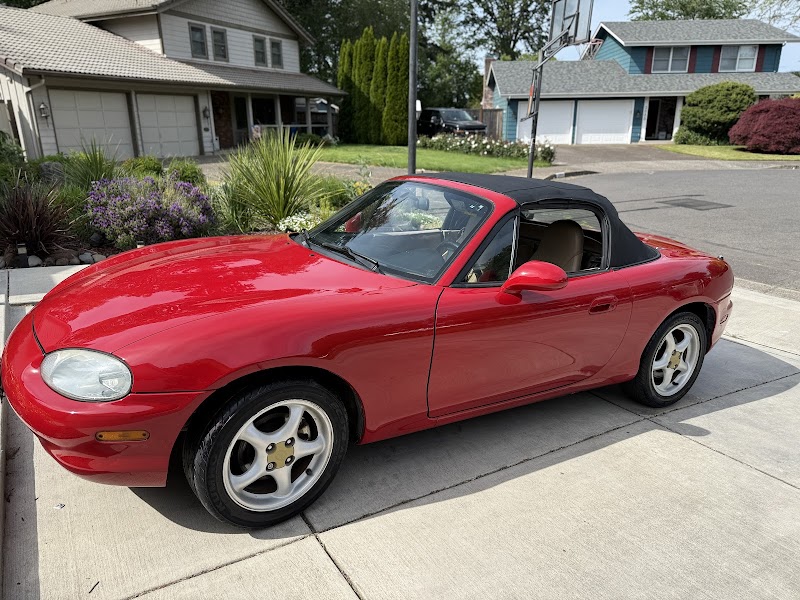Before and after comparison of major accident damage restoration.