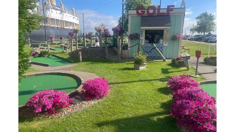 Captain J's Miniature Golf banner