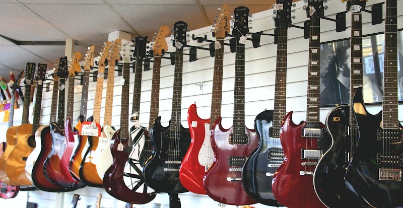 Tigard Pawn 4 More photo