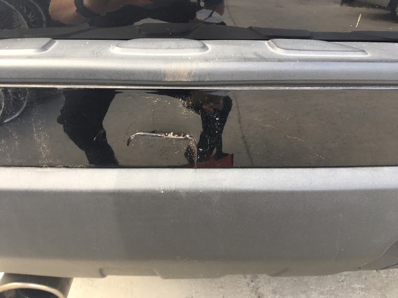 Completed restoration of a Ford Ranger with rear and side damage fully repaired and repainted
