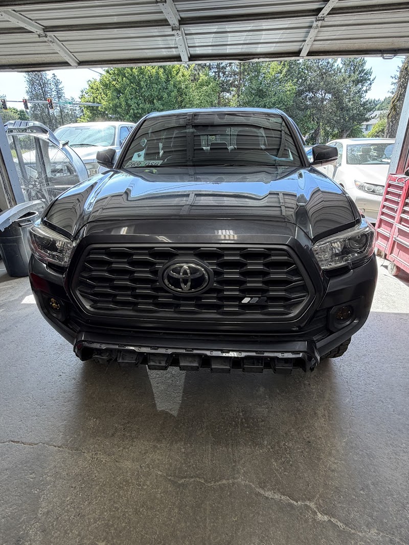 Close-up of frame alignment work during a collision repair