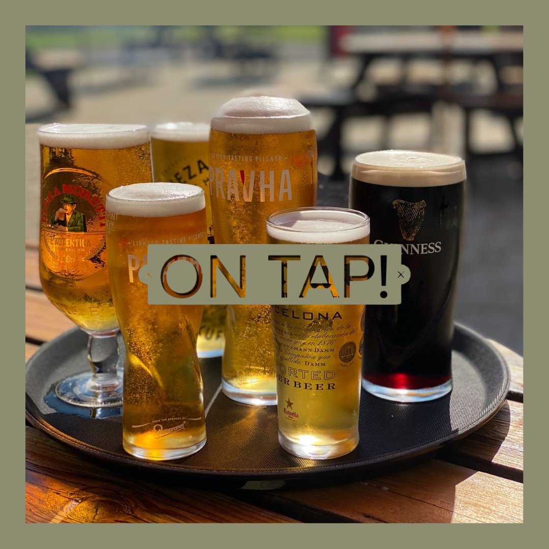 Cosy pub dining area with wooden tables at The Old Crown