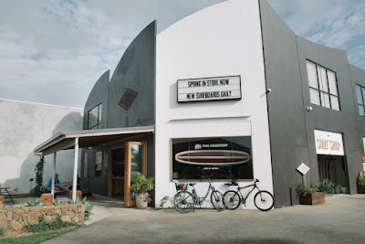 McTavish Surfboards - Byron logo