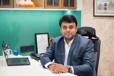 Dr. Milind Chauhan