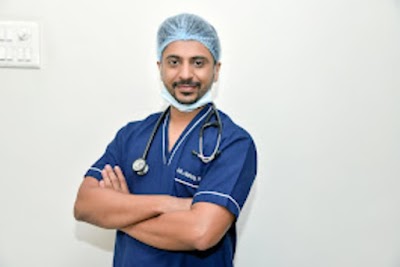 Dr Anand Popat