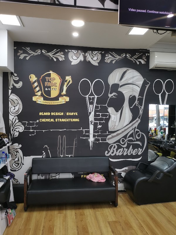 Top fade & cuts photo 1