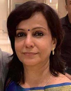 Dr. Minie Anand