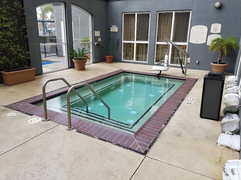On-site gym and hot tub for guest relaxation