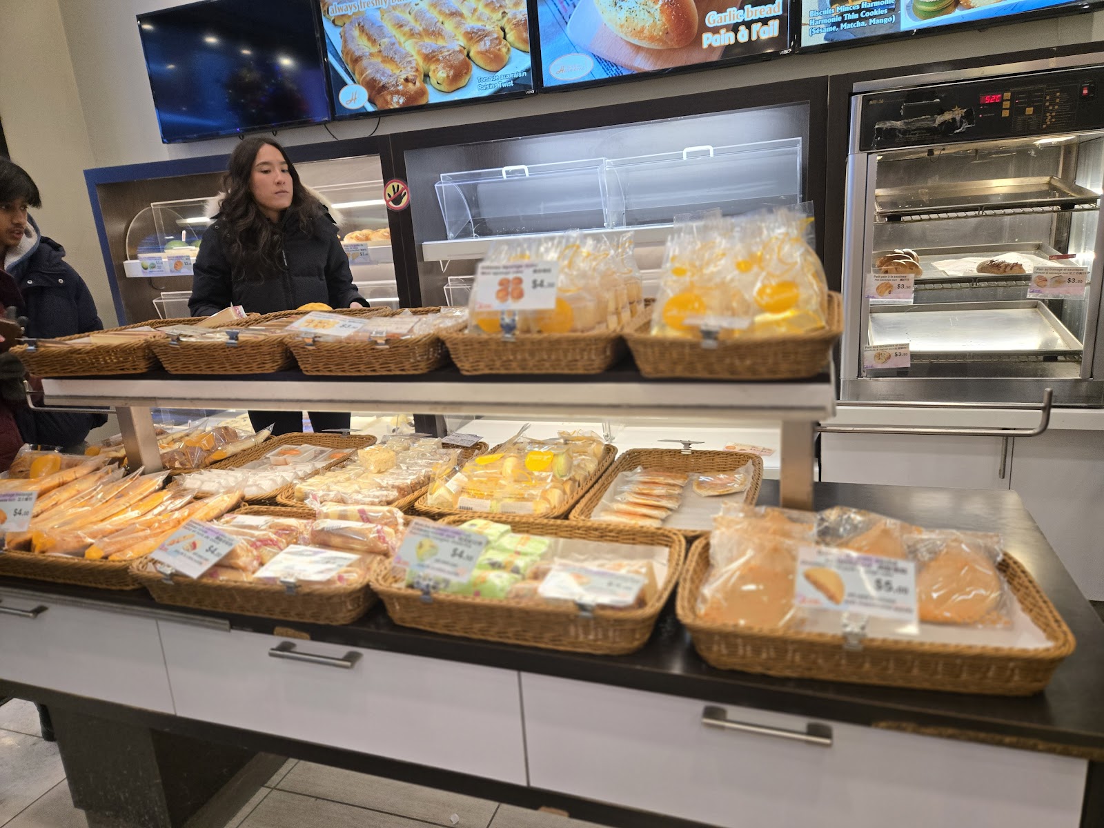 Assortment of elegant mini pastries and tarts on display