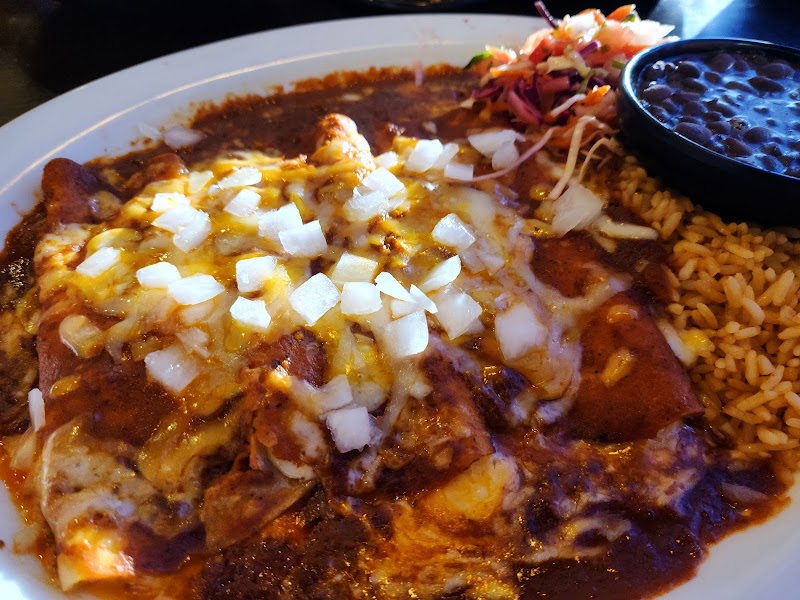 Colorful fajitas and warm interior at Hacienda Colorado on North Nevada Avenue