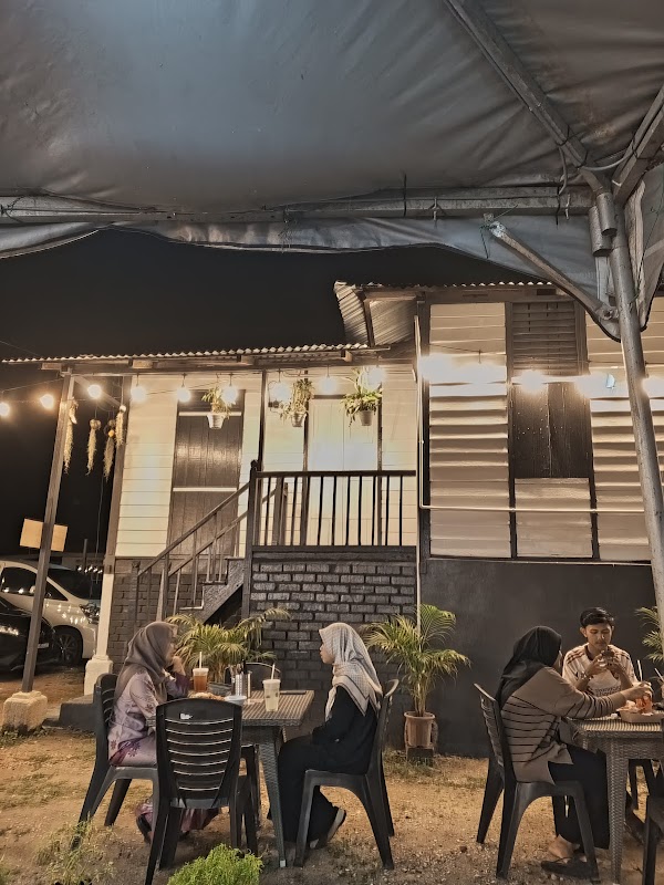 Manche Cafe & Restaurant - Photo 1