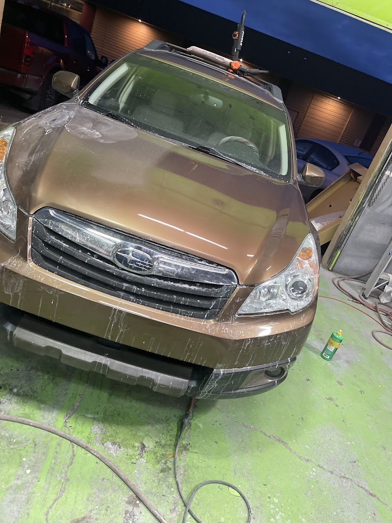 Detailing service bringing out the shine on customer vehicle