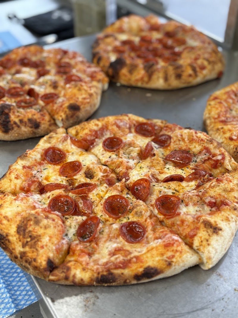Nelly Belly Woodfired Pizza & Piadina: Restaurant & Outdoor Patio with Sand Volleyball, Bocce, Cornhole & Music
