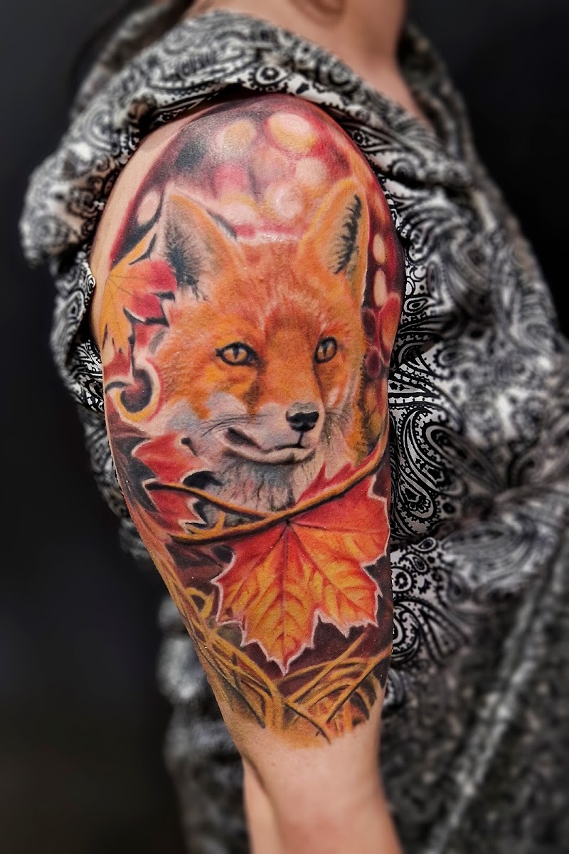 Invictus Tattoo & Piercing