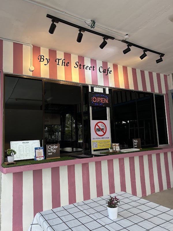 By The Street Cafe - Photo 1