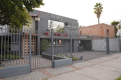 Clínica Capilar Unity - Implante Capilar Técnica F.U.E. logo