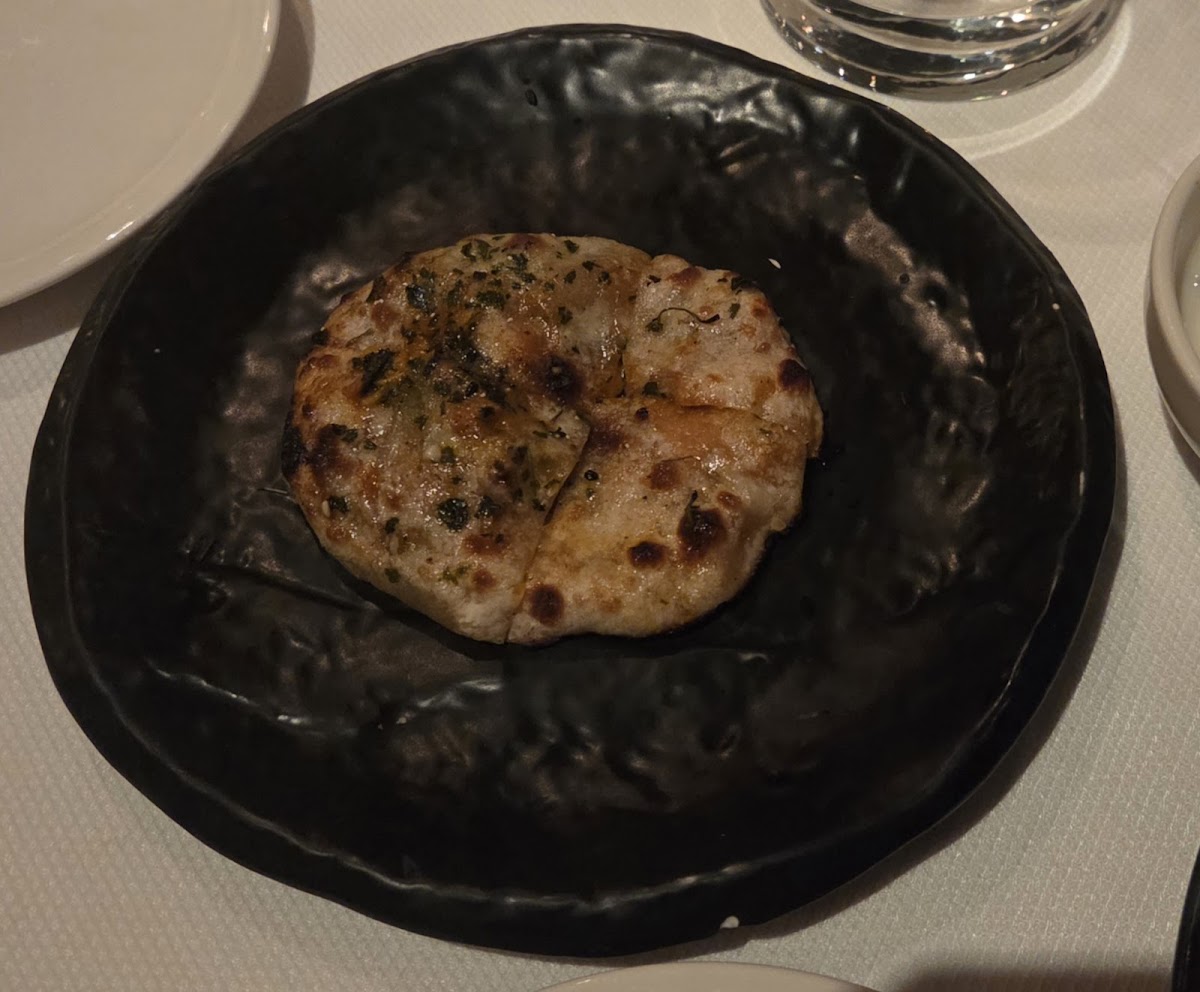 Indian Accent's exquisite stuffed kulcha, showcasing its elegant plating and refined flavors.