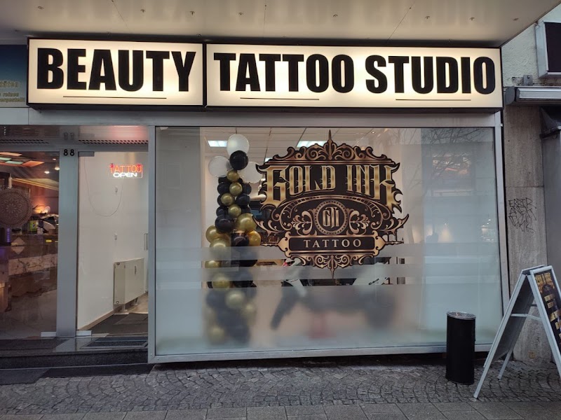 Gold Ink Tattoo