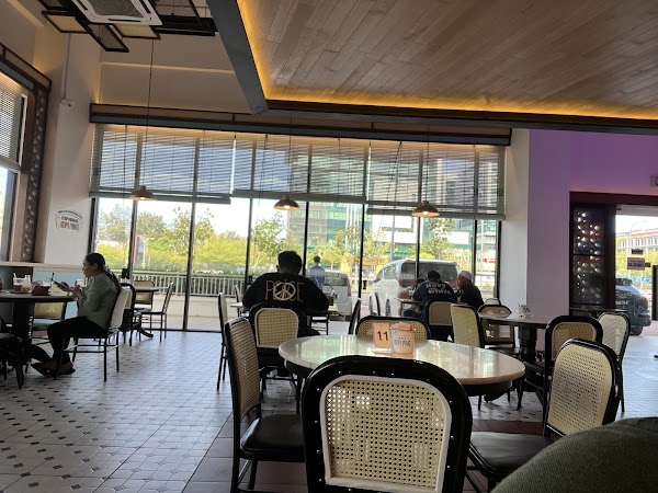 Kopi Ping Cafe - Photo 1