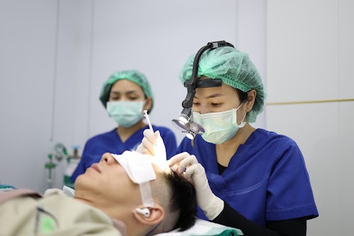 Hairtran Clinic logo