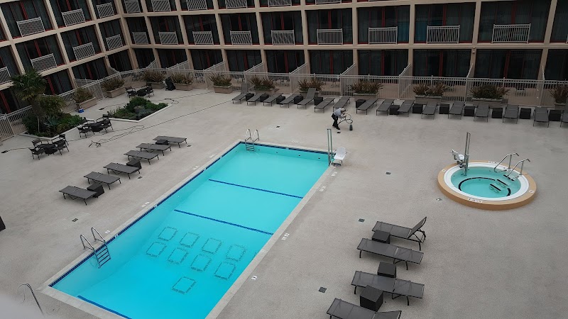 Outdoor pool and hot tub for relaxation