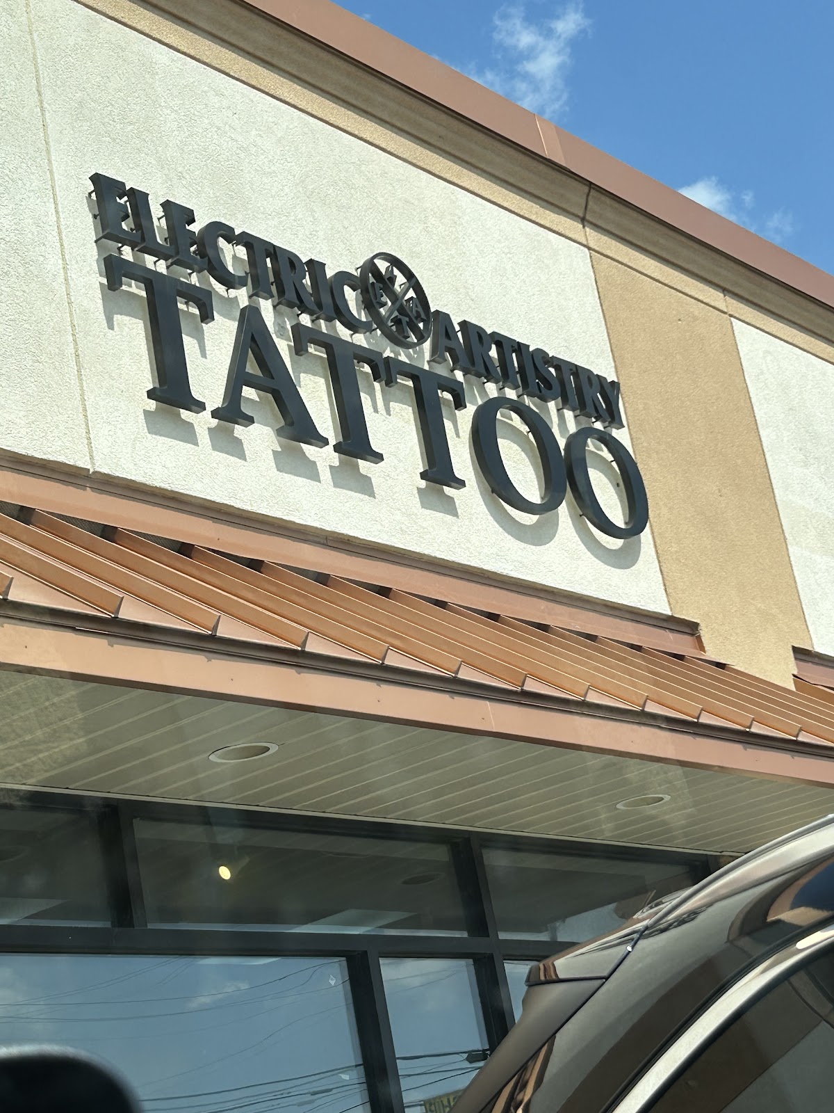 Electric Artistry Tattoo & Piercing tattoo parlor in Camden, PA