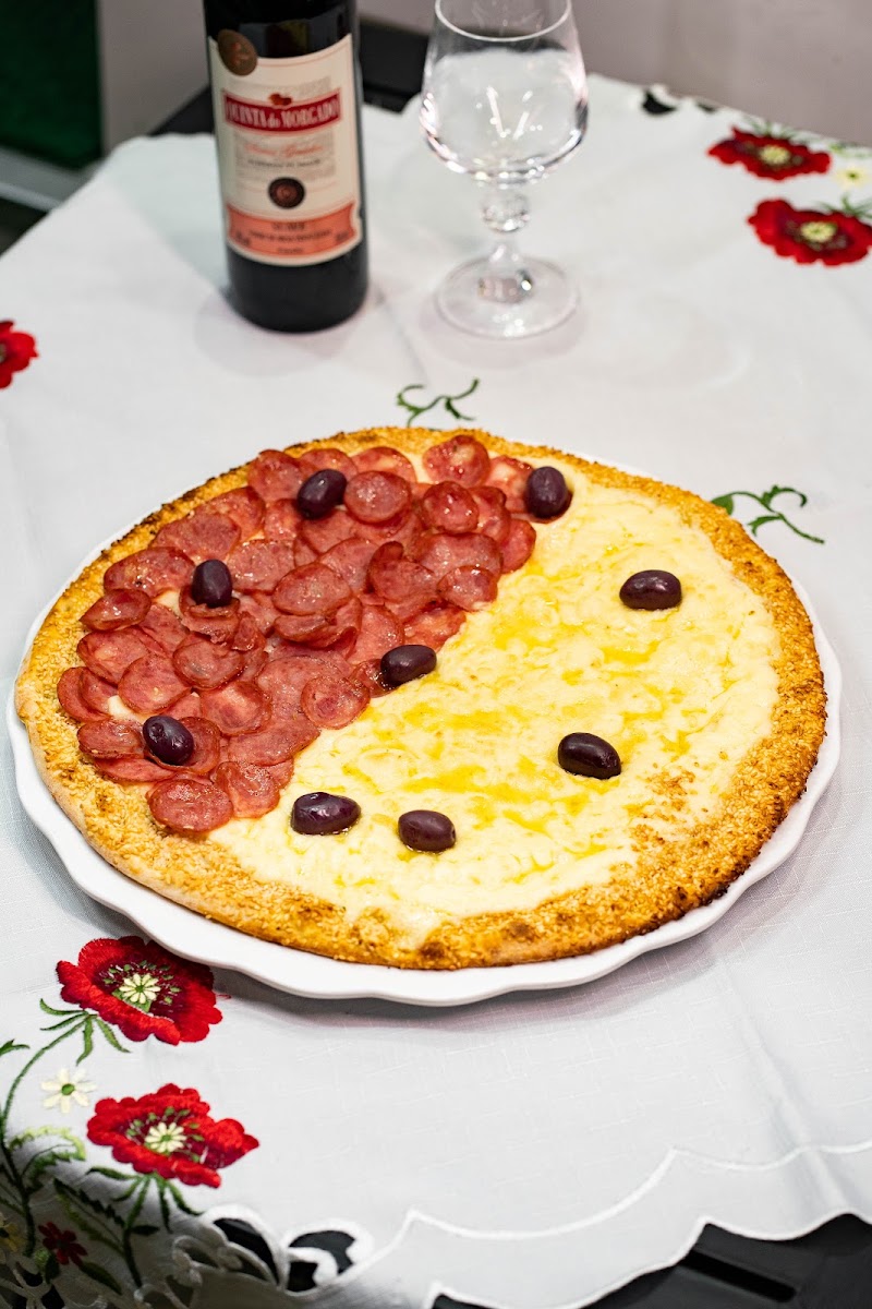 Foto de Mano Pizzaria