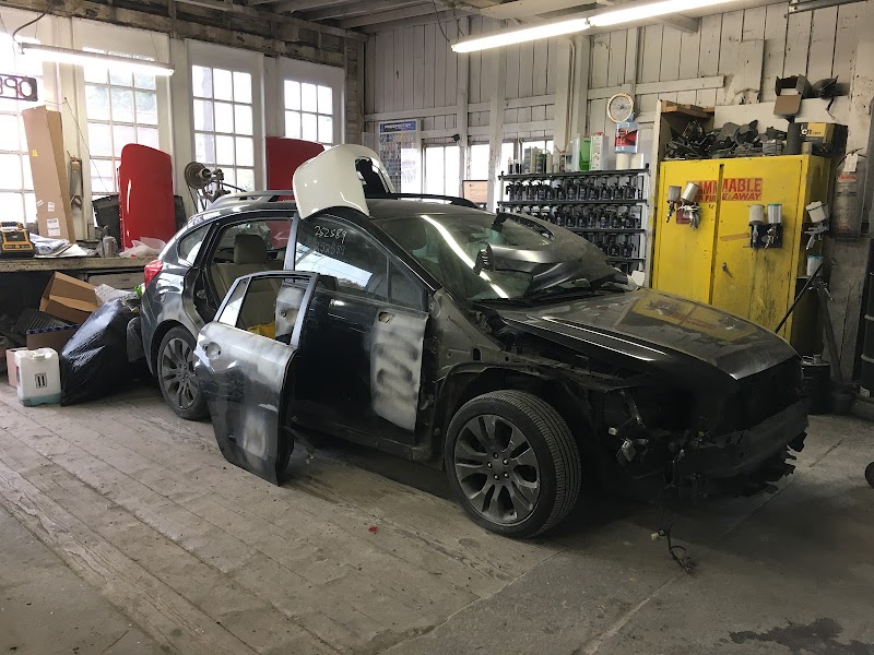 Paint blending in progress on a Rivian—matching factory finish with precision.