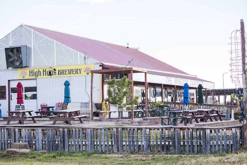 Brewery nestled in a hops field with mountain views
