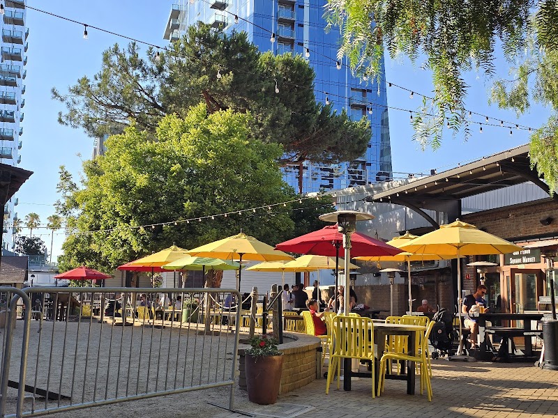 Indoor and outdoor seating with heated patio lamps