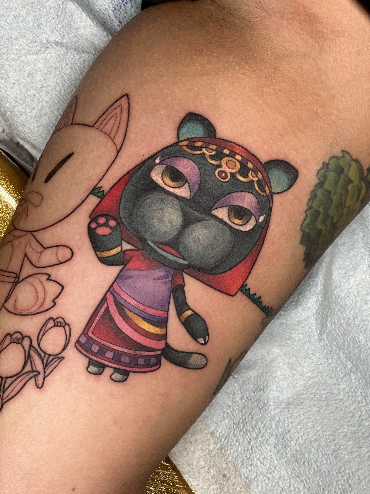Over the Moon Tattoo Studio tattoo work — photo 3