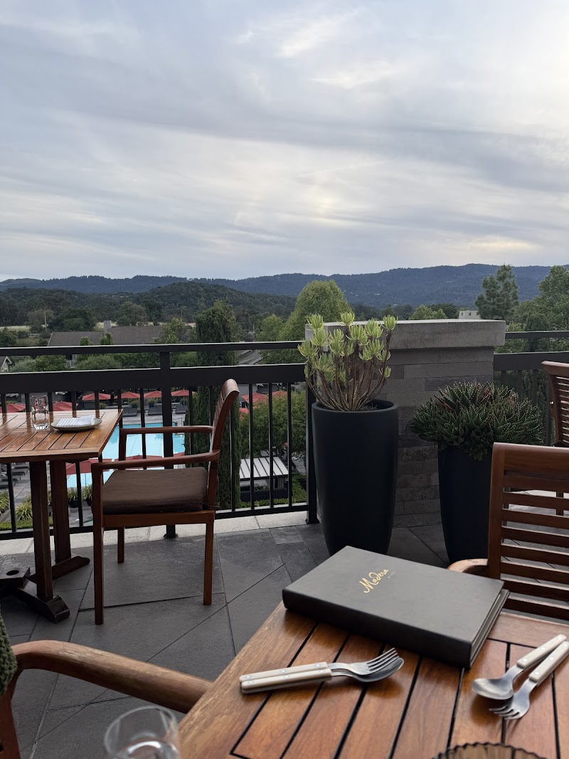 Outdoor seating with hillside views