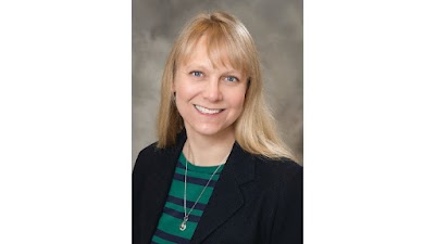 Dr. CARLA BETH AAMODT