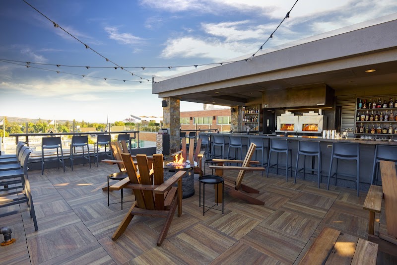 Sky & Vine rooftop bar with mountain views