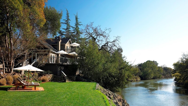 Warm, intimate cottage setting with riverside views