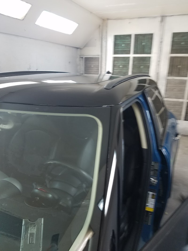 Final touch-ups and quality inspection before vehicle delivery.